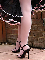 mature in platforms and black stockings