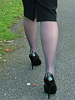 office girl in heels and tights