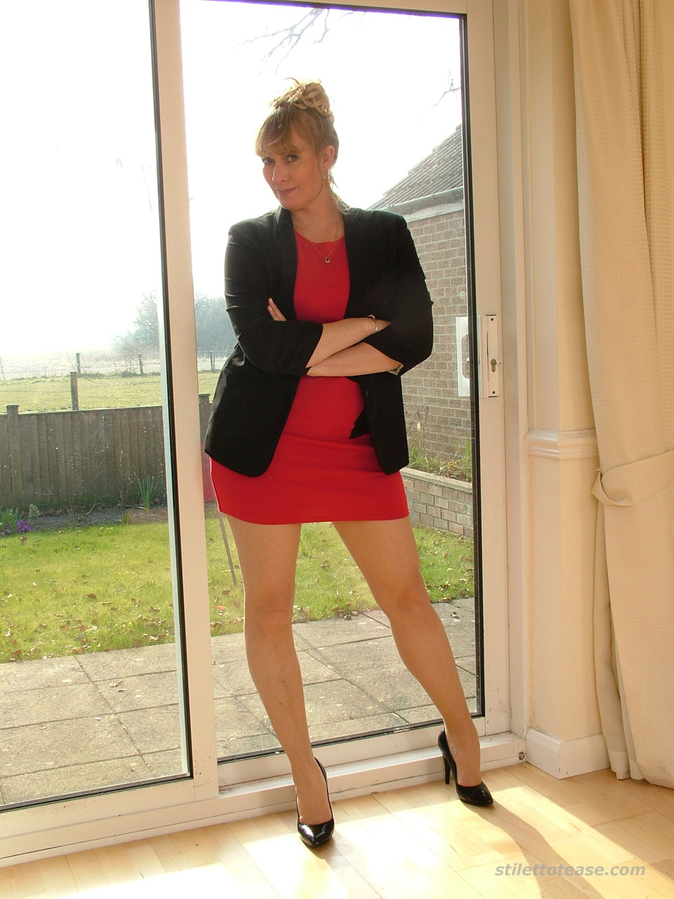 Sensual secretary in heels and nylons