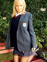 Kelly strips that schoolgirl uniform right off, black bra barely containing those perky tits underneath